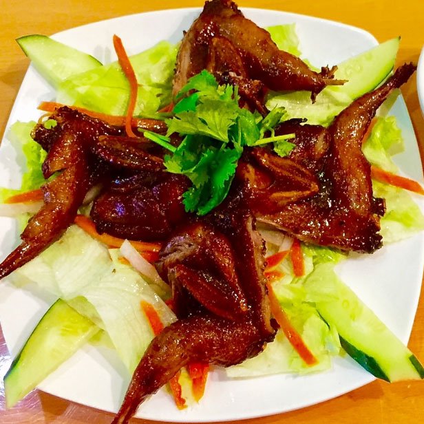 A11. Whole Quail Fried on Salad